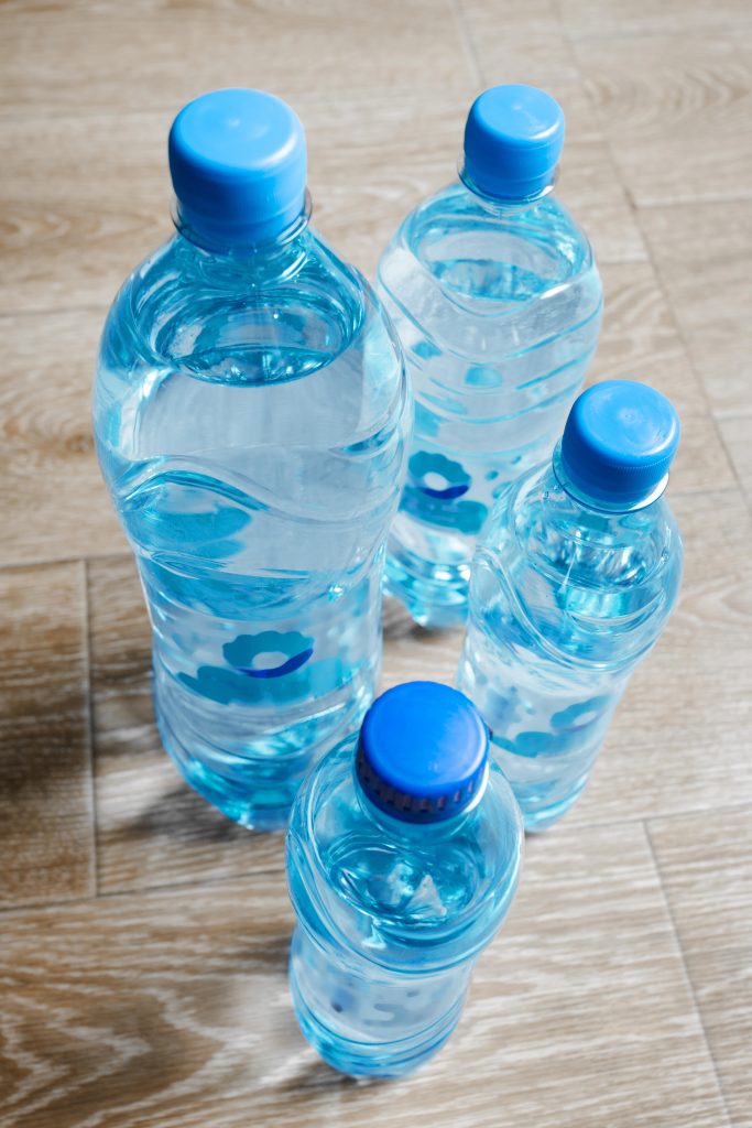 Three Bottled Water in the wooden desk